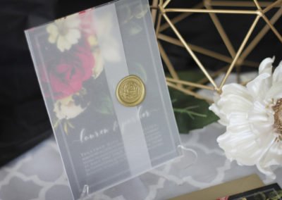 Moody Flowers Wedding Invitation with vellum wrap and wax seal